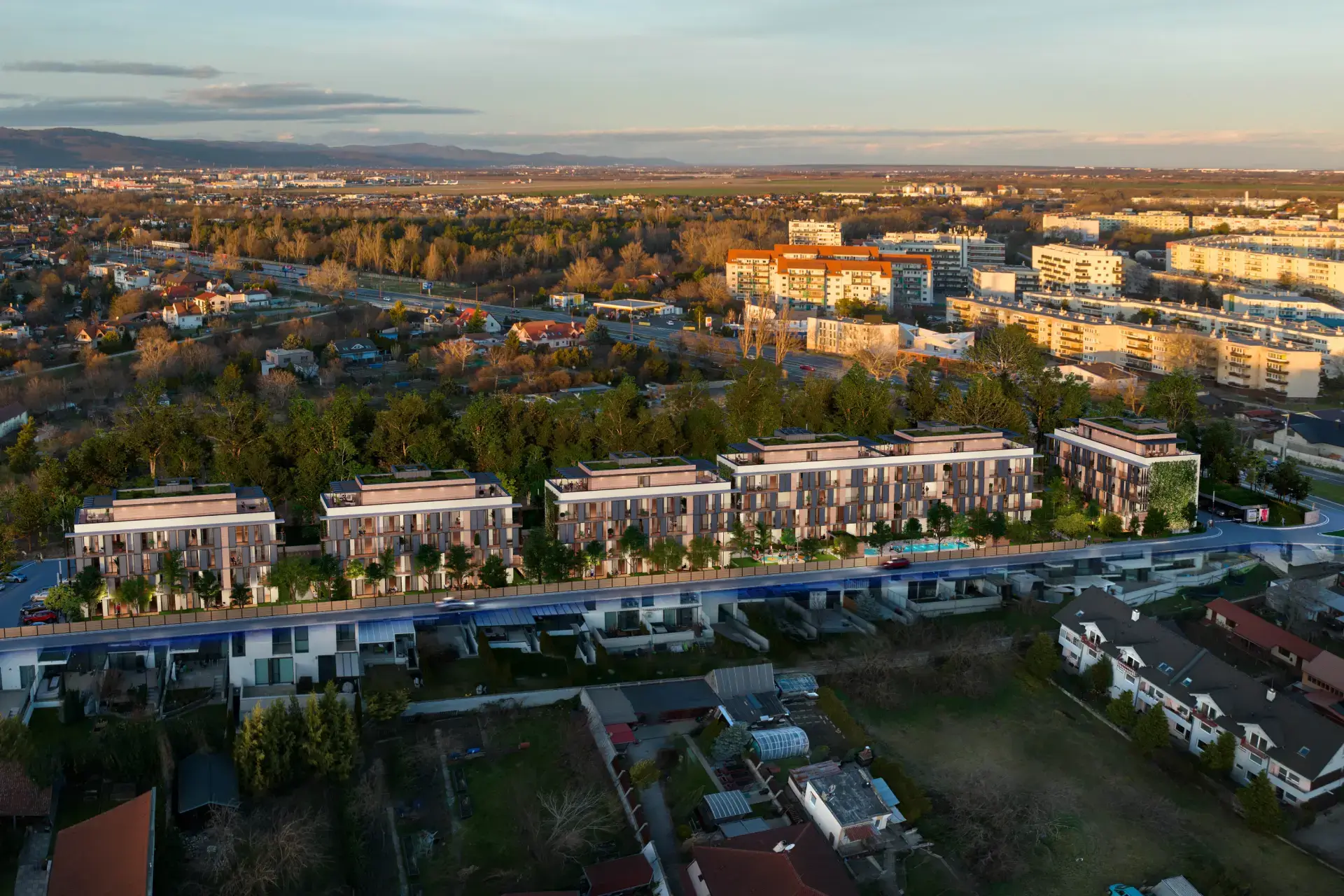 Letecká vizualizácia projektu Laurin Dvor v Podunajských Biskupiciach, ktorý ponúka moderné bývanie v šiestich bytových domoch uprostred zelene a s výbornou dostupnosťou do centra Bratislavy.