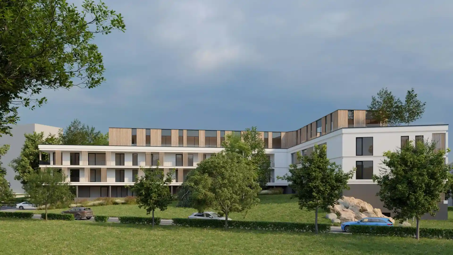 Vizualizácia bytového domu s balkónmi a ustúpeným vrchným podlažím